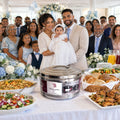 Grande boîte isotherme inox 20 L TACSAM sur le buffet d'un baptême