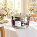 Boîte isotherme inox TACSAM 30 L grand format sur une table de fête claire et fleurie