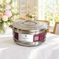 Boîte repas isotherme inox TACSAM 8,5 L sur une table de famille claire et fleurie